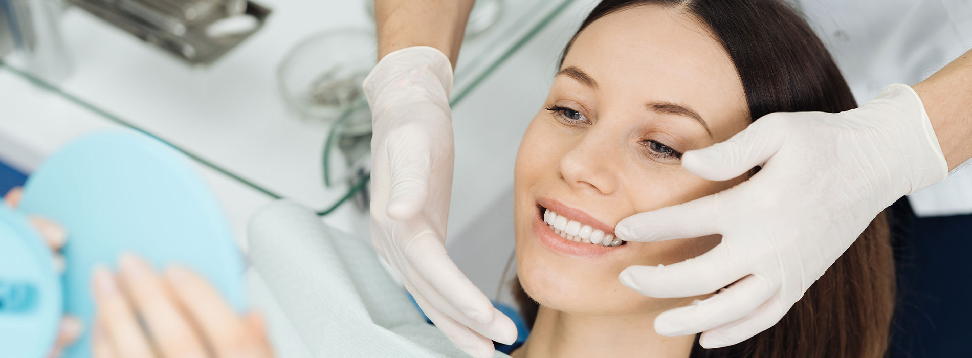 The image shows a woman receiving a facial treatment with a smiling expression, while a person wearing gloves applies a product on her face, and another individual takes a close-up photo of her.
